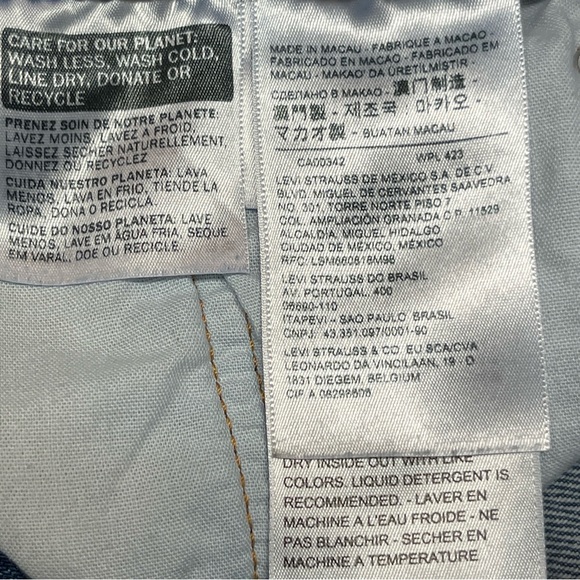 Levis Women Size 27 501 Shorts Blue Jeans Light Wash Denim Button Fly Distress - Picture 9 of 11